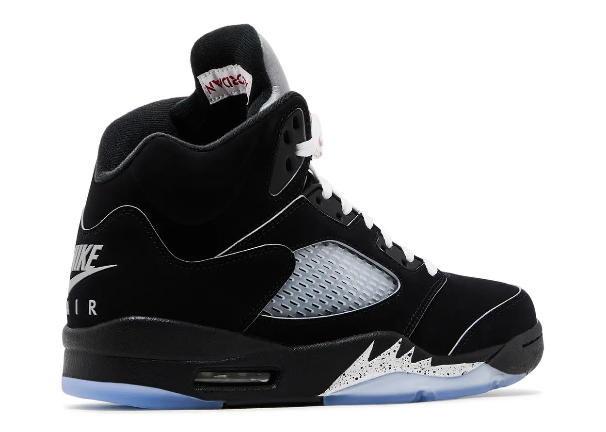 Black high-top sneaker with white accents on a white background