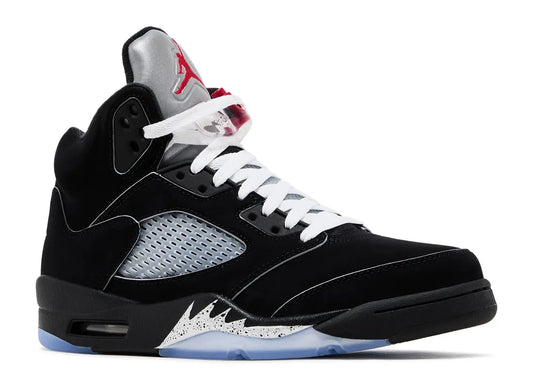 Black and white sneaker with red accents on a white background